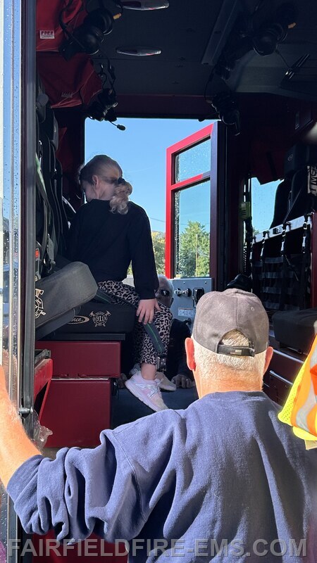 Fire Police Steve Bata helping the children out of the truck