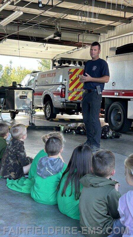 Deputy Chief Adam Jacobs talking to the students