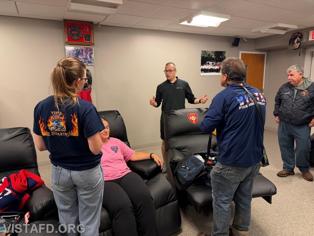 A/C Brian Porco reviewing patient assessment with EMT Olivia Flynn during the "EMS Call Scenarios" drill