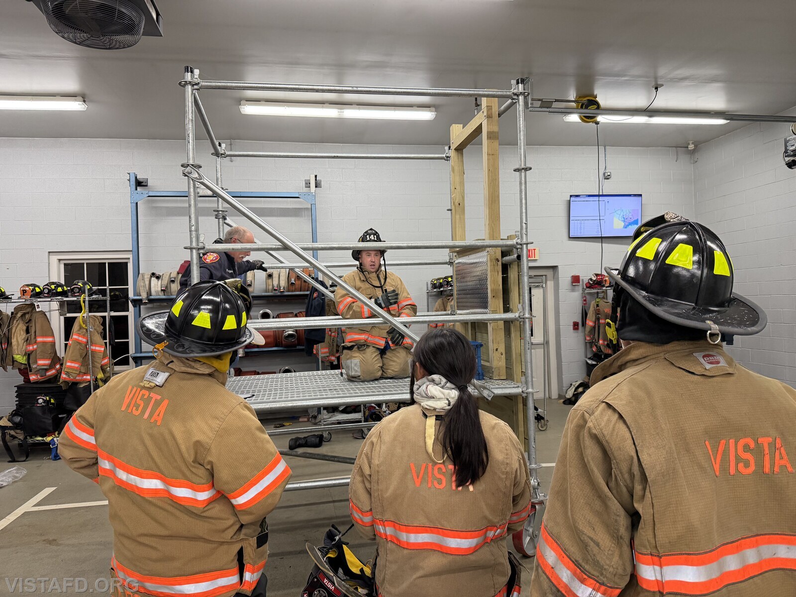 Lead Foreman Mike Peck reviewing Firefighter bailout procedures