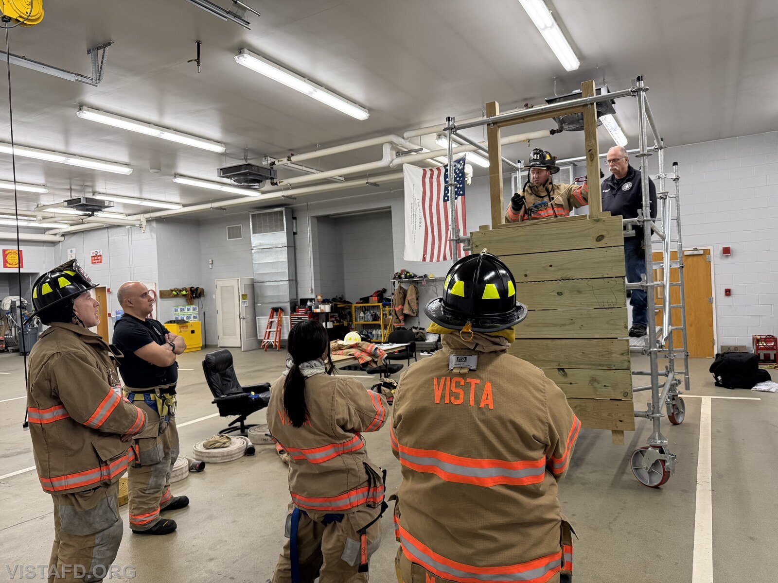 Lead Foreman Mike Peck demonstrating Firefighter bailout techniques to Vista Firefighters