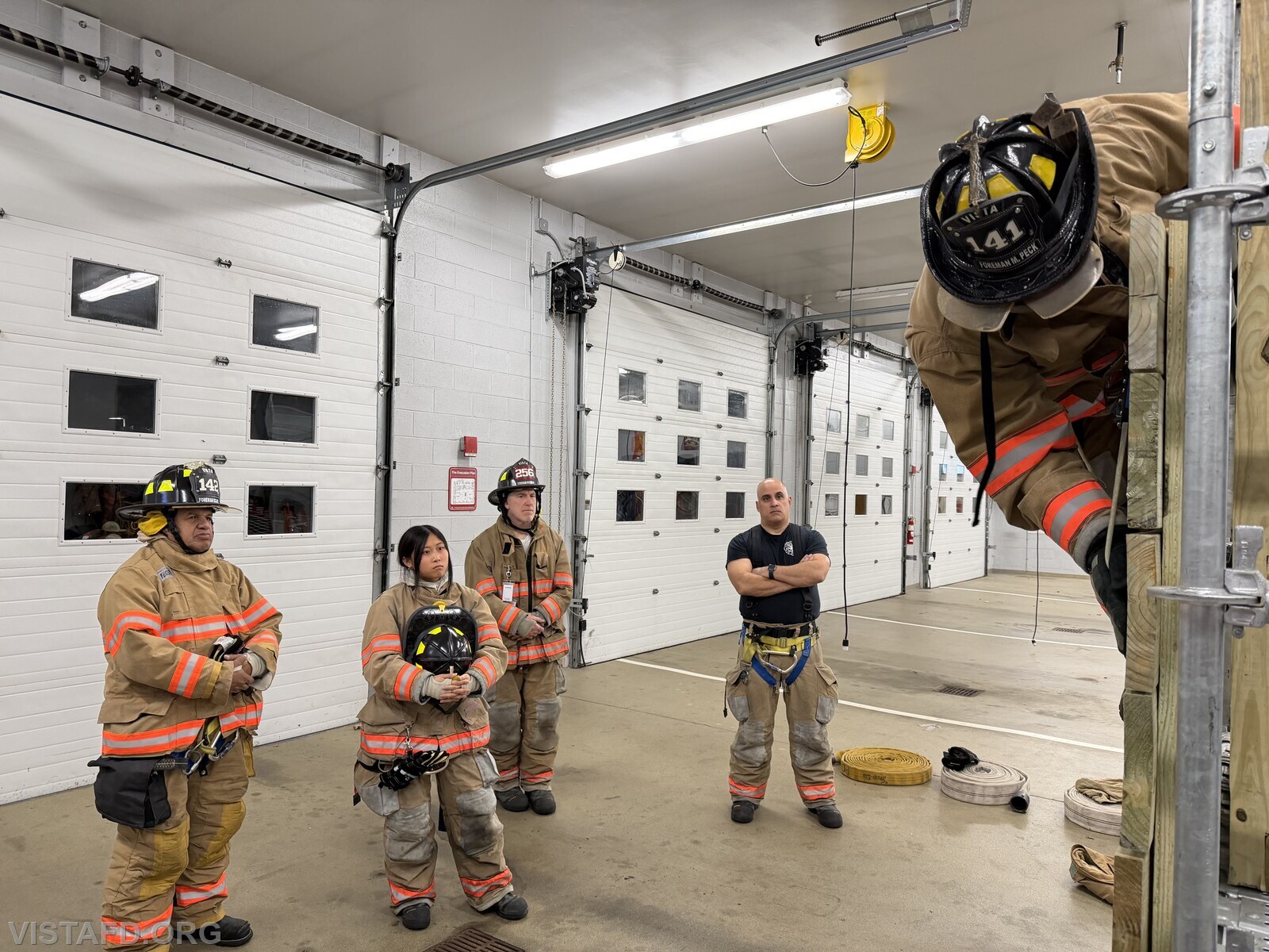 Lead Foreman Mike Peck demonstrating a Firefighter bailout "jump"