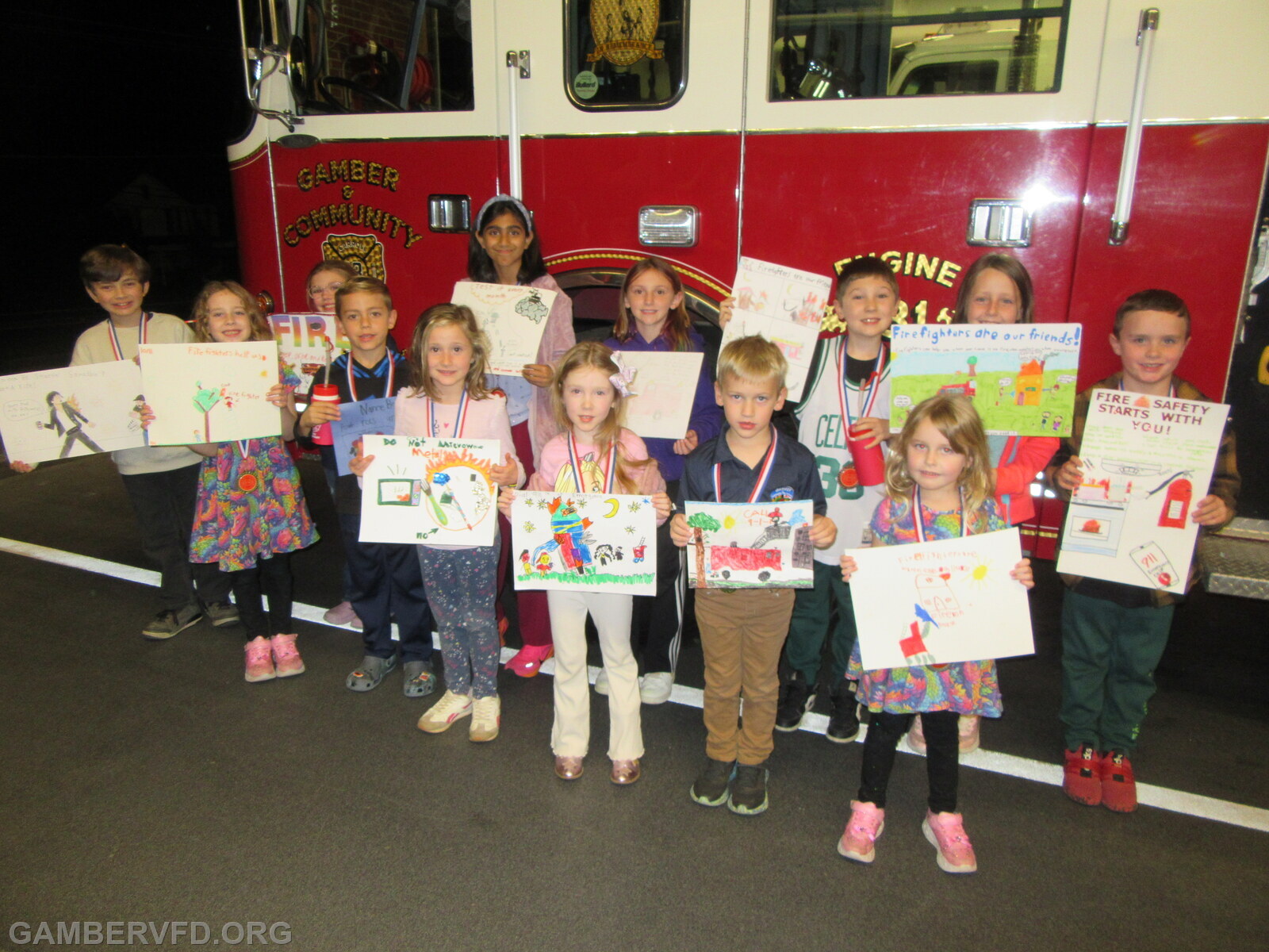 All 13 winners of this year's fire prevention poster contest.