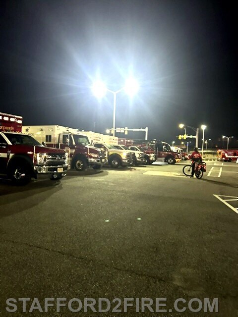 Fire and EMS resources from participating jurisdictions assemble in preparation for medical operations during the 51st Marine Corps Marathon.