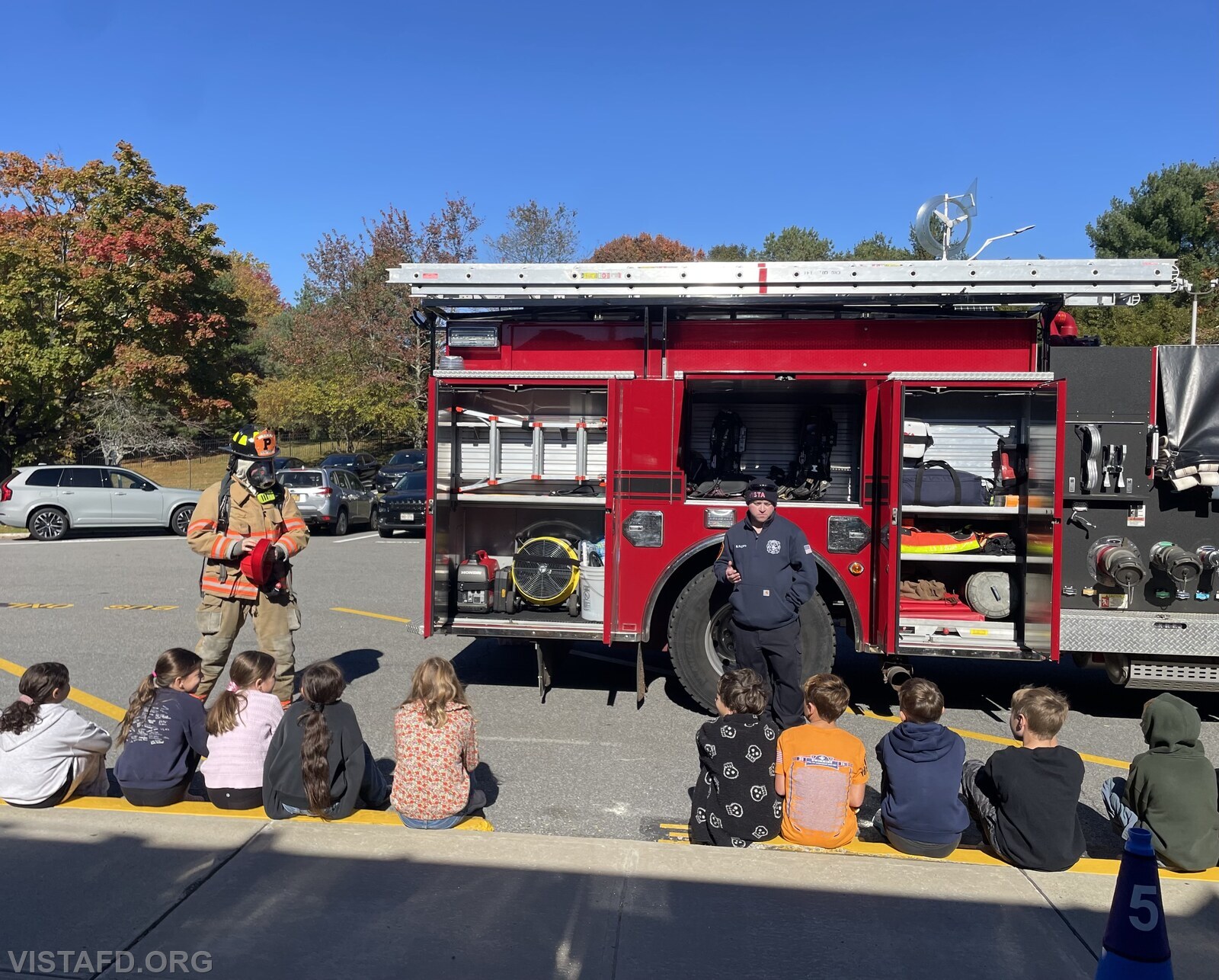 Station Manager Carl Johnson and Lead Foreman Ryan Ruggiero conducting Fire Prevention Week at Meadow Pond Elementary School